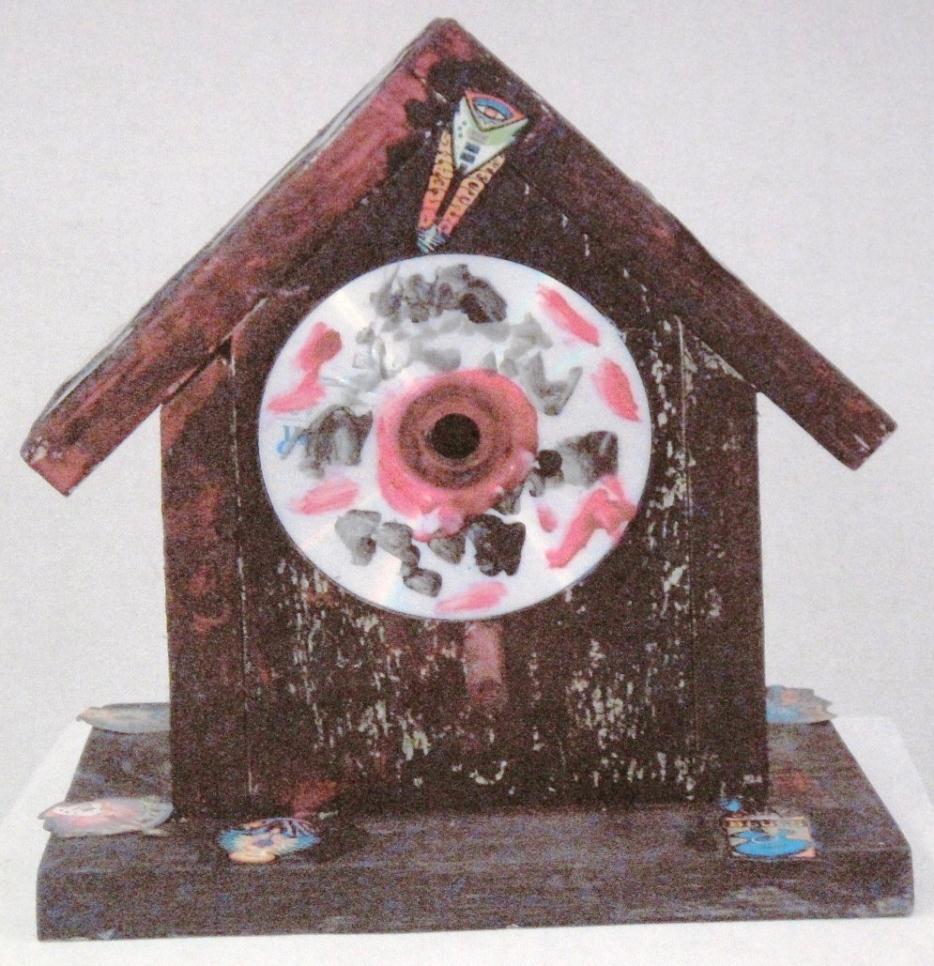 Red painted birdhouse