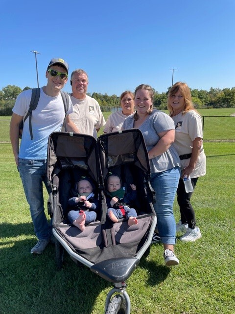 A family of five (plus some twins) gathered in memory of Graham Campbell at the Into the Light Suicide Awareness Walk.